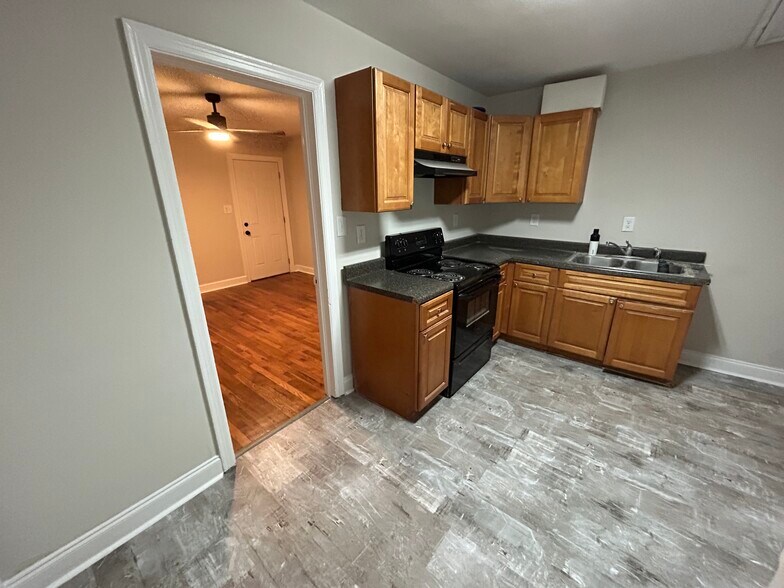 Kitchen looking into living room area - 305 Orange St