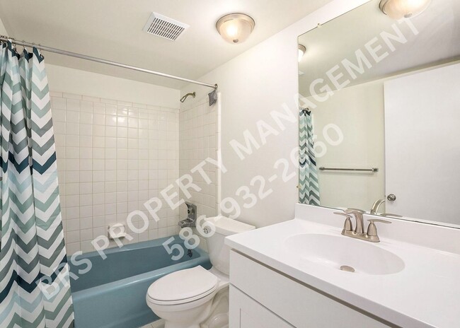 Building Photo - Charming 2-Bedroom Condo in Clinton Twp. –...