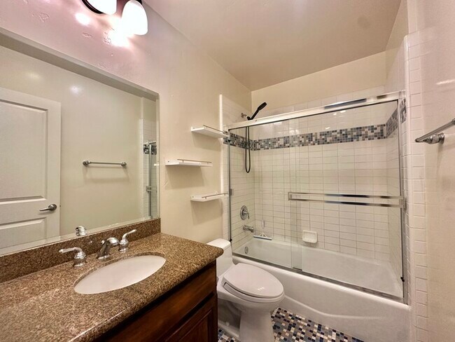 Building Photo - Beautifully Renovated Multi-Level Living C...