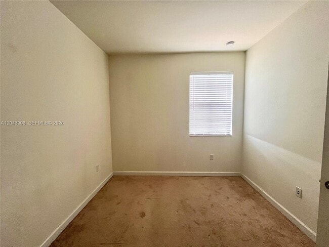 Building Photo - 9271 W 33rd Ln