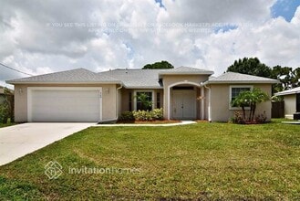 Building Photo - 668 SE Damask Ave