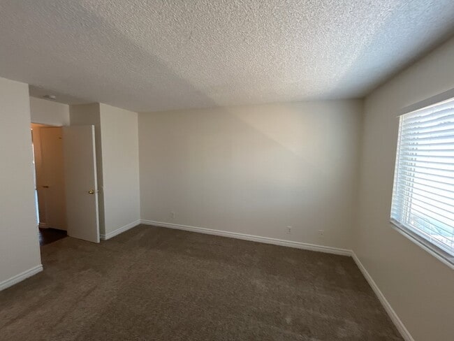 Building Photo - 2 bedroom 2 bathroom second level unit centrally located in the El Sol del Pueblo community.