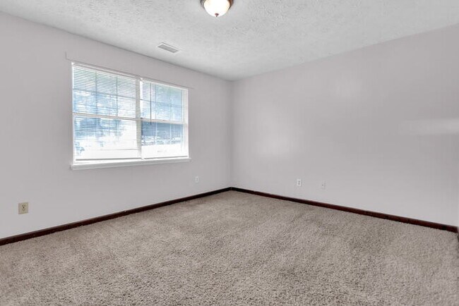 Building Photo - Upgraded Duplex with Huge Yard
