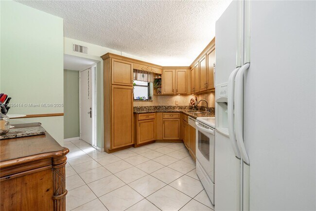 Building Photo - 5750 Camino Del Sol