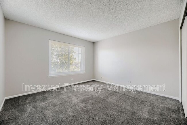 Building Photo - 9330 E Girard Ave