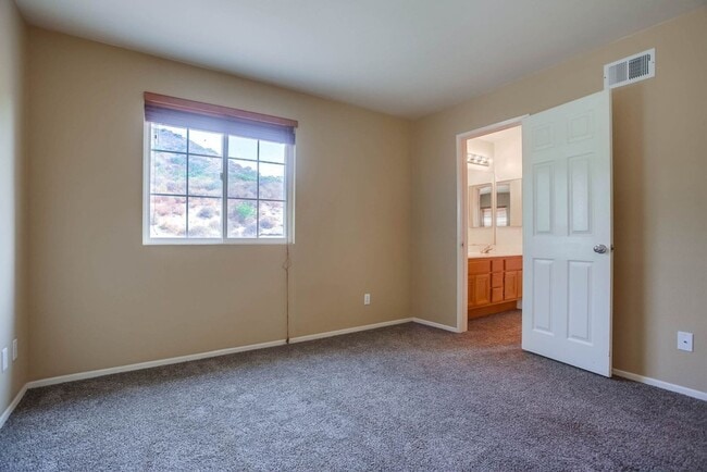 Building Photo - Available Now!! Spacious 4 Bedroom Plus a ...