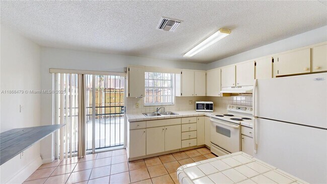 Building Photo - 6415 SW 129th Pl