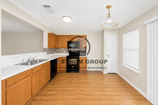 Building Photo - 7120 Planters Row Dr
