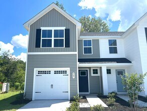 Building Photo - New Three-Bedroom, Two and one-half Bath T...