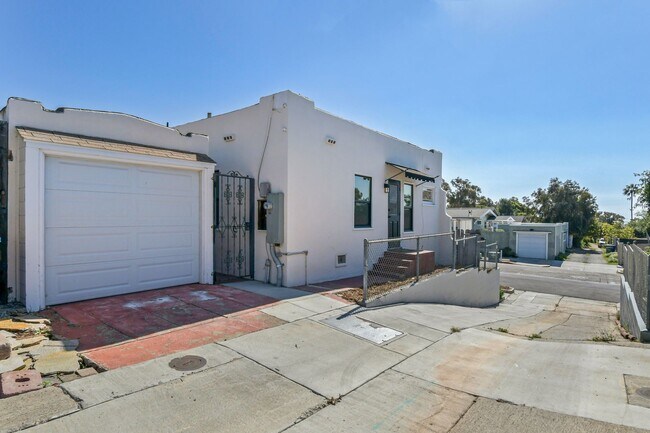 Building Photo - Move In Special!!  Elevated Golden Hill 2BR with Southwesterly Views with A/C & Detached Garage