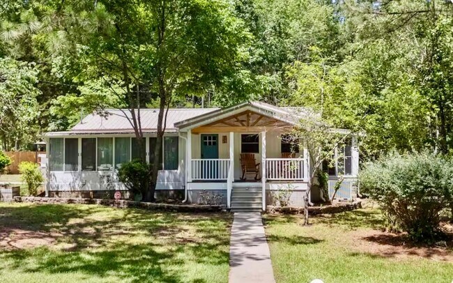 Building Photo - This FULLY FURNISHED ALL INCLUSVIE HOME IS...