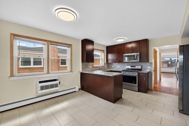 Building Photo - 8312 W Summerdale Ave