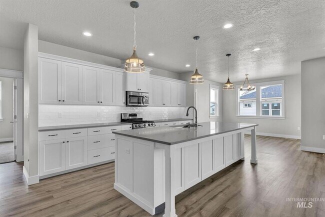 Building Photo - Immaculate Single-Level Home w/3-Car Garage