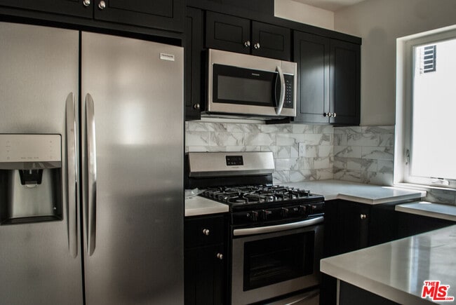 Building Photo - 5015 1/2 Marathon St