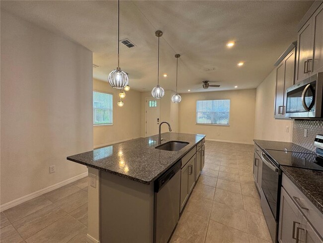 Building Photo - 8936 Matriarca Aly