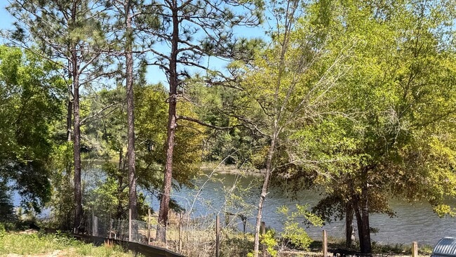 Building Photo - SPECTACULAR WATER-VIEW W/ LARGE DECK BRAND...