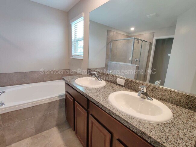 Building Photo - 7408 French Marigold Ave.