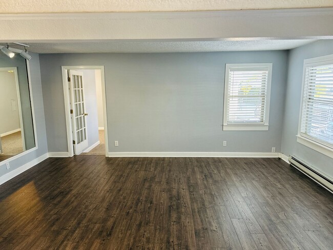 Building Photo - Charming Updated Home Centrally Located