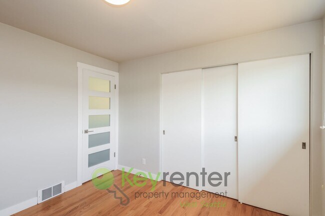 Building Photo - Waterfront Elegance with Private Dock and Designer Finishes