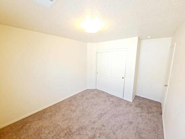 Building Photo - Gorgeous 4-bedroom, 2-bath home featuring two spacious living areas