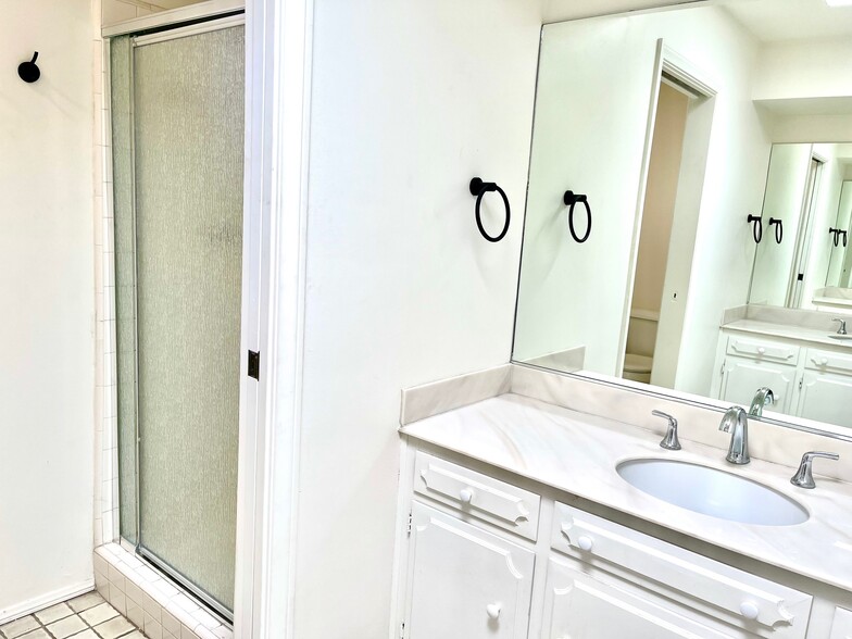Primary Bath dual vanities - 1115 S La Peer Dr