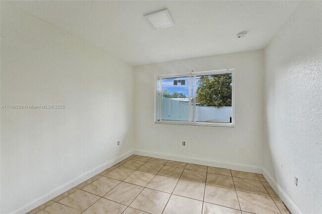 Building Photo - 1154 NW 103rd St