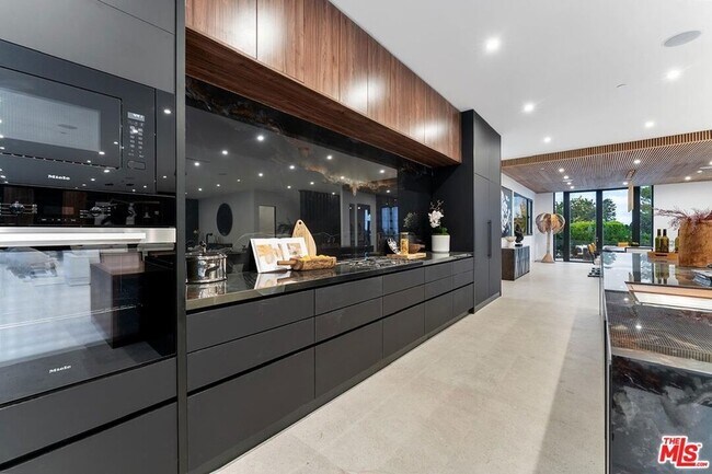 Building Photo - 9031 Alto Cedro Dr