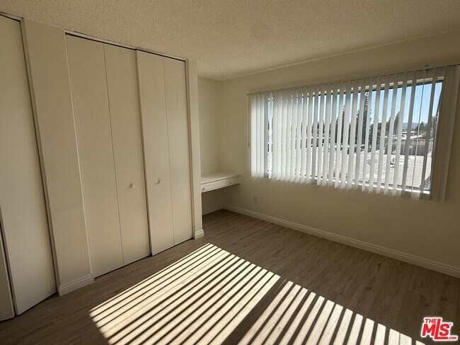 Building Photo - 10200 De Soto Ave