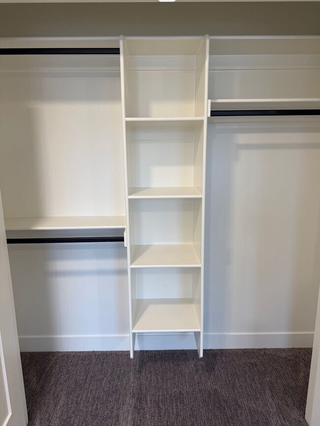 Building Photo - Half off first months rent - Beautiful townhome with 2 car garage, Central Air and Master Suite