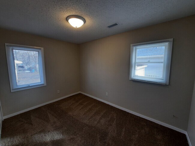 Building Photo - Pet Friendly, no weight/breed restrictions! Detached Garage!