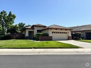 Building Photo - Three Bedroom Two Bathroom Home - NEW PRICE