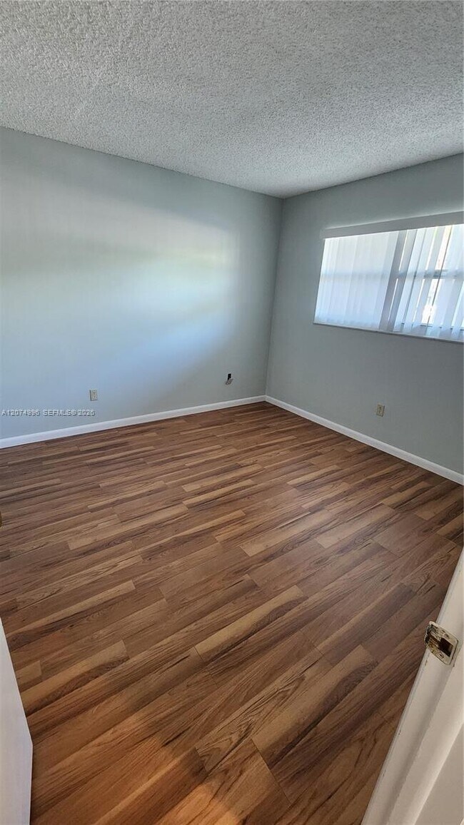 Building Photo - 6550 Royal Palm Blvd