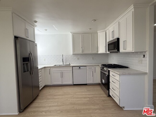 Building Photo - 1410 Maltman Ave