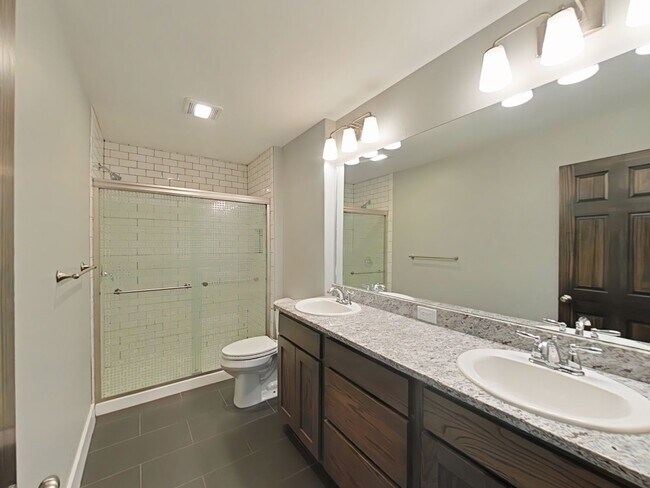 Building Photo - Stunning 3-bedroom, 2.5-bathroom condo with attached 2 stall garage!