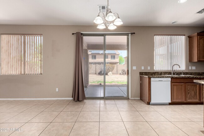 Building Photo - 7352 W Valencia Dr