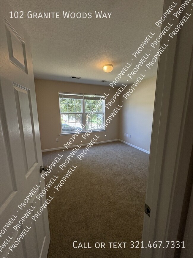 Building Photo - 102 Granite Woods Way