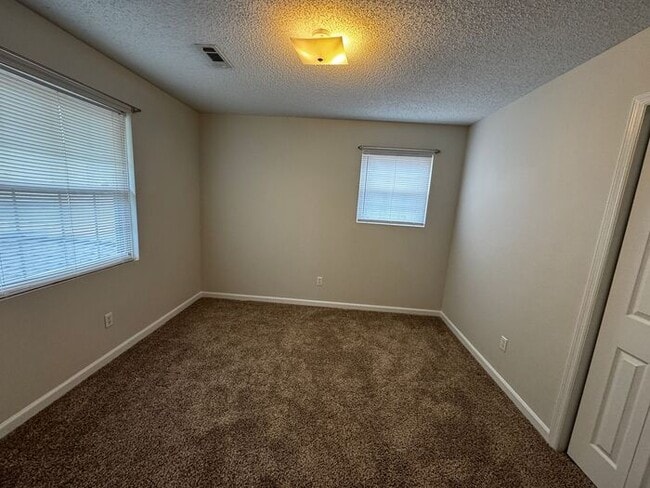 Building Photo - Townhome with attached garage near Tech Corridor and Research Park