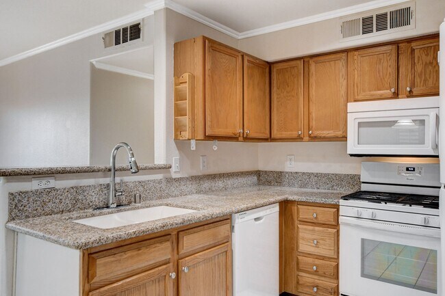 Building Photo - AMERICANA Property Mgmt - Gated 1st floor ...