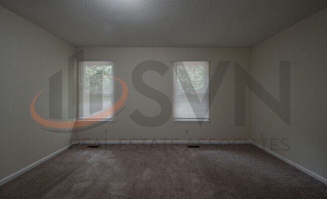 Building Photo - 3BR, 2BA Durham Home with Deck and LVP Flooring