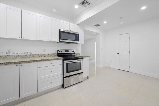 Building Photo - 9312 NW 3rd Ave