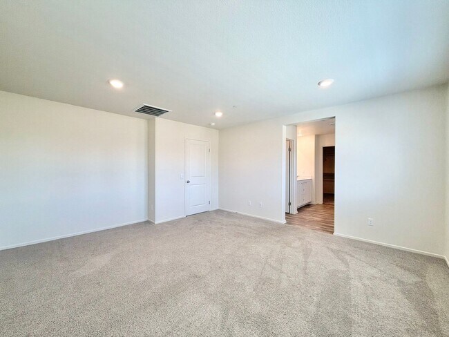 Building Photo - Modern 4 Bedroom 3 Bathroom Living with INCLUDED Solar & Entertainer’s Backyard