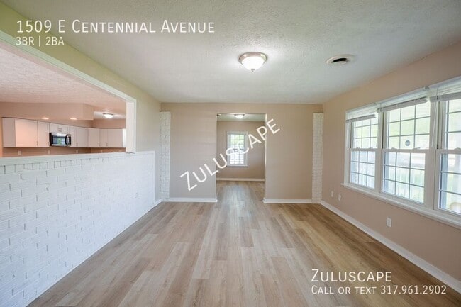 Building Photo - 1509 E Centennial Ave