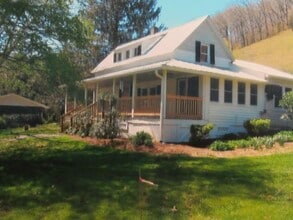 Building Photo - $1,600 - 2 Bed / 1.5 Bath House on Caney Fork with Stunning Landscaped Gardens