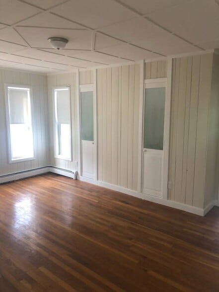 Living room with storage - 89 Congress St