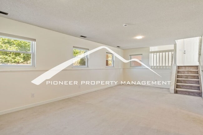 Building Photo - Updated 4 Bed, 2 Bath Home in Briargate with Mountain Views, fully fenced yard, 2 car garage and AC