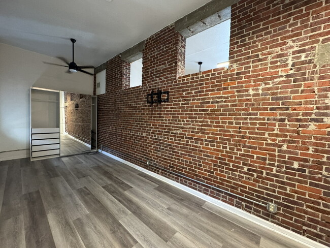 Building Photo - Live in a Piece of History – Unique Condo ...