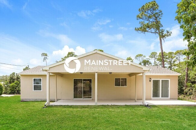 Building Photo - 3 Bedroom Pet-Friendly Home in PORT CHARLOTTE, FL with Main Street Renewal