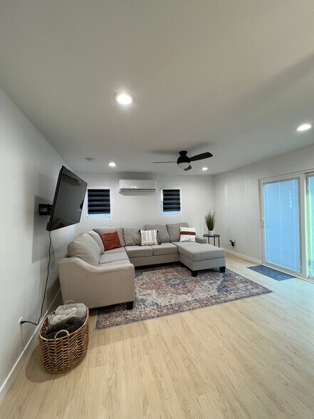 Comfy couch with retractable smart TV. - 2016 N Ave