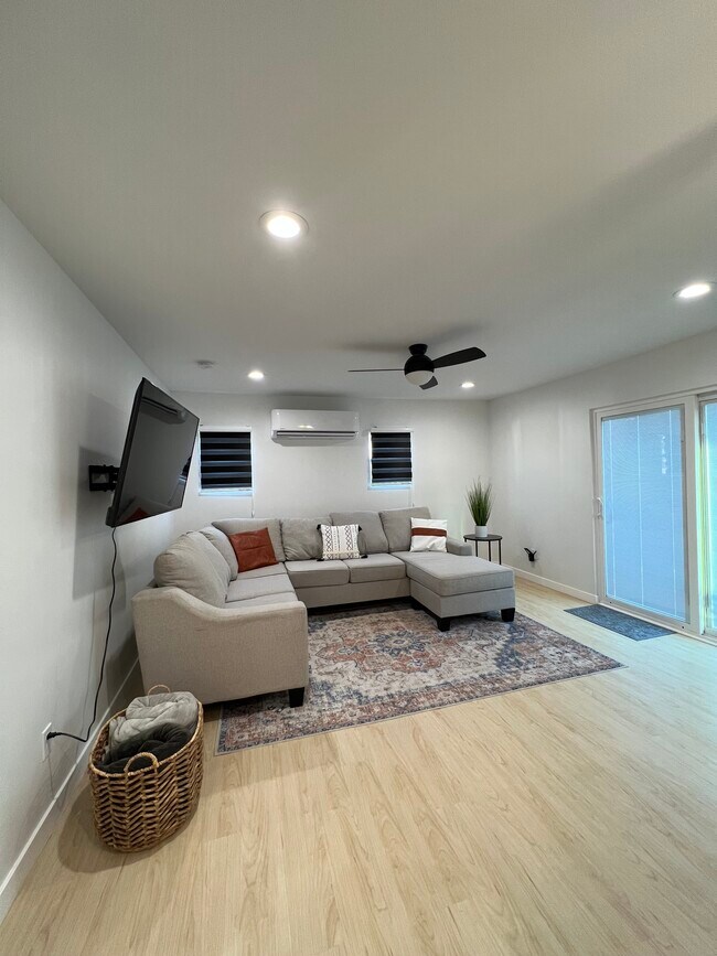 Comfy couch with retractable smart TV. - 2016 N Ave