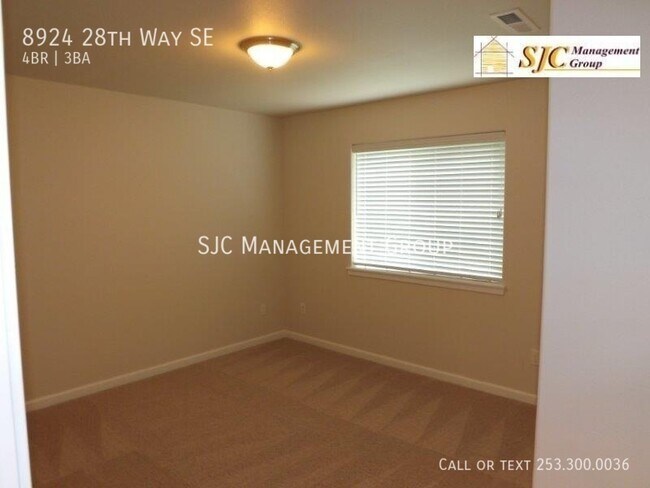 Building Photo - 8924 28th Way SE